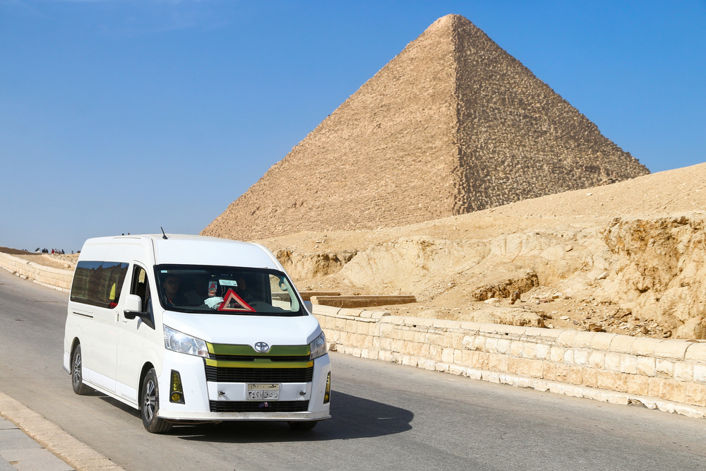 Giza,,Egypt,-,January,26,,2021:,Touristic,Van,Toyota,Hiace Private Car and Pyramide